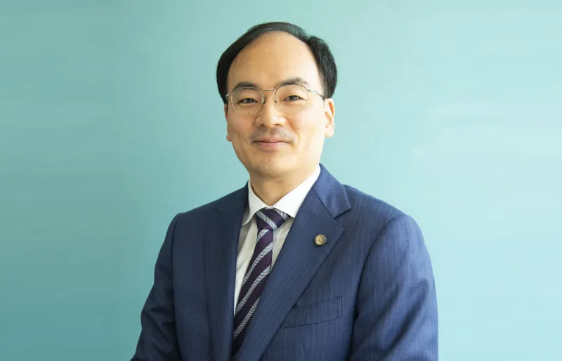 入江 義治